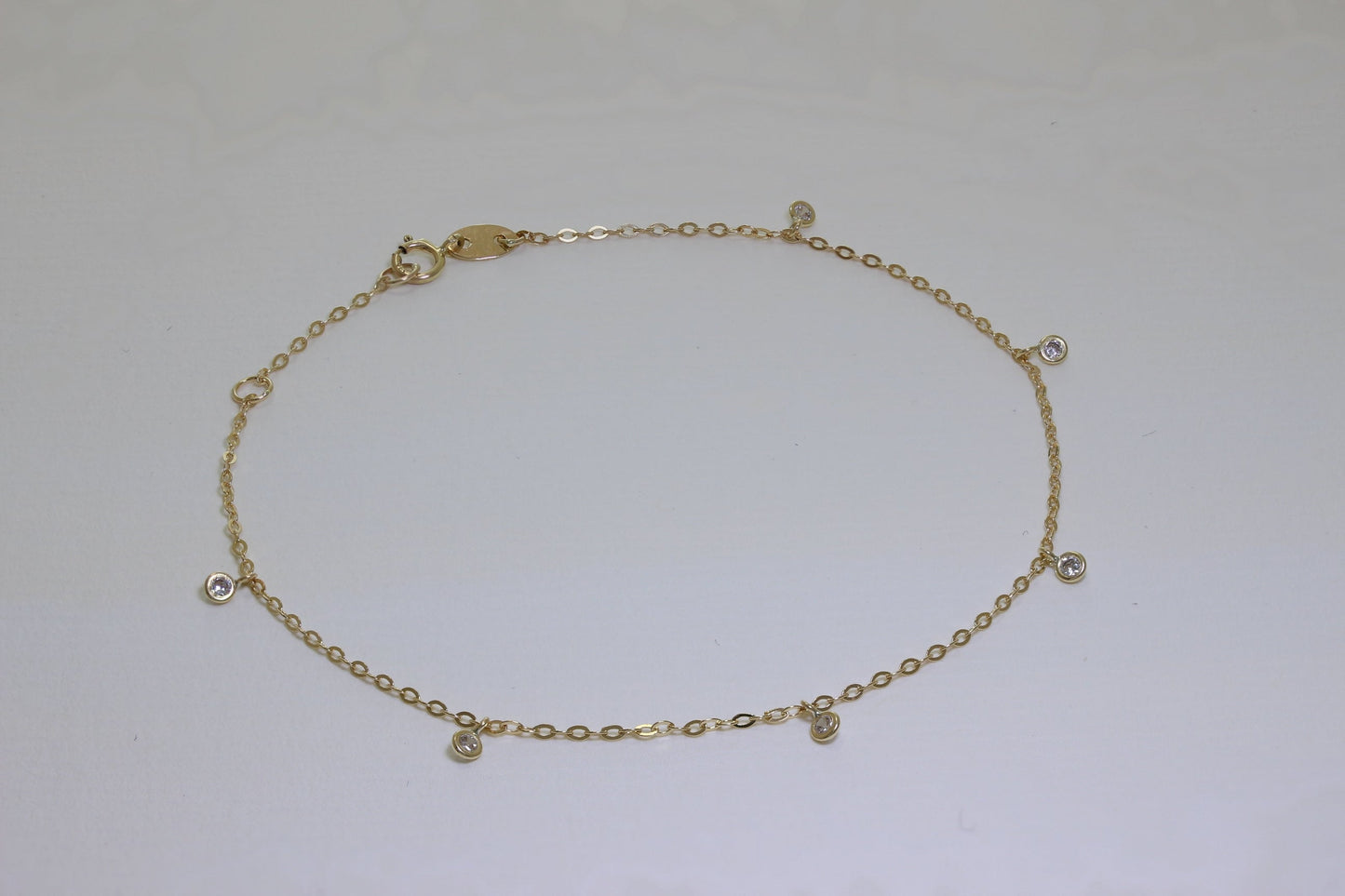 Bracelet extensible de 18 cm en or 9 carats et cristal CZ transparent