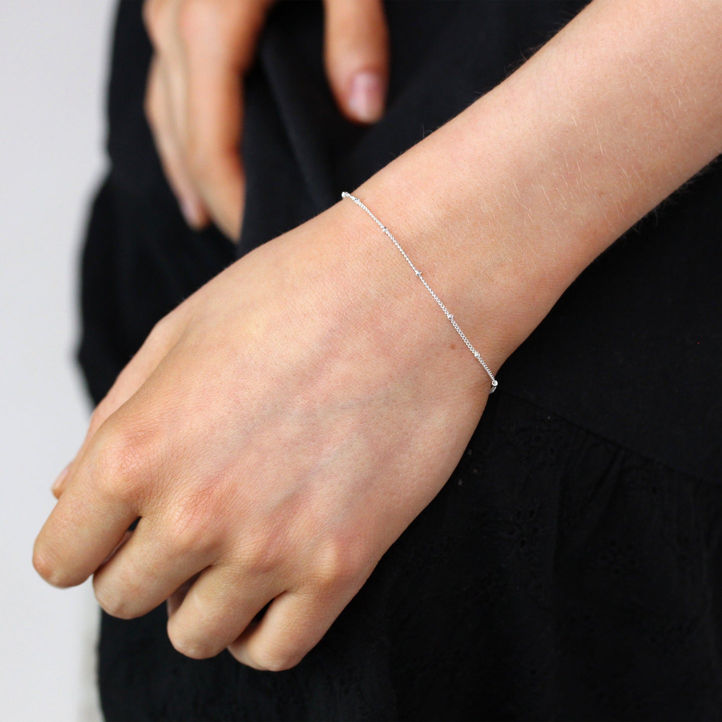Bracelet gourmette en argent sterling avec pompon et diamants