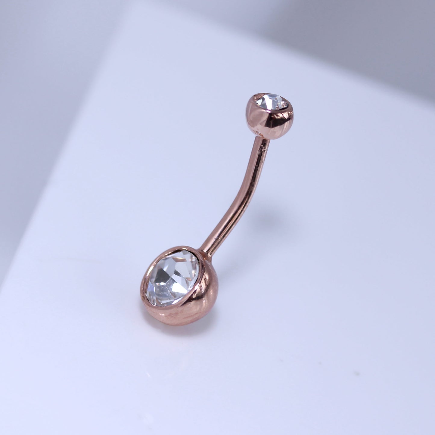 Piercing de nombril en argent sterling plaqué or rose avec double boule en zircone cubique