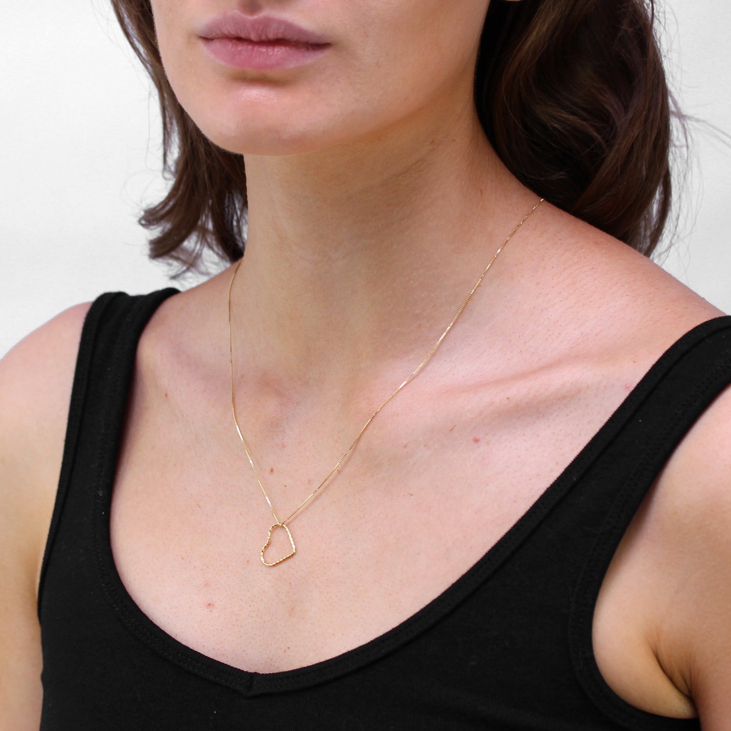 Collier cœur flottant torsadé en or 9 carats