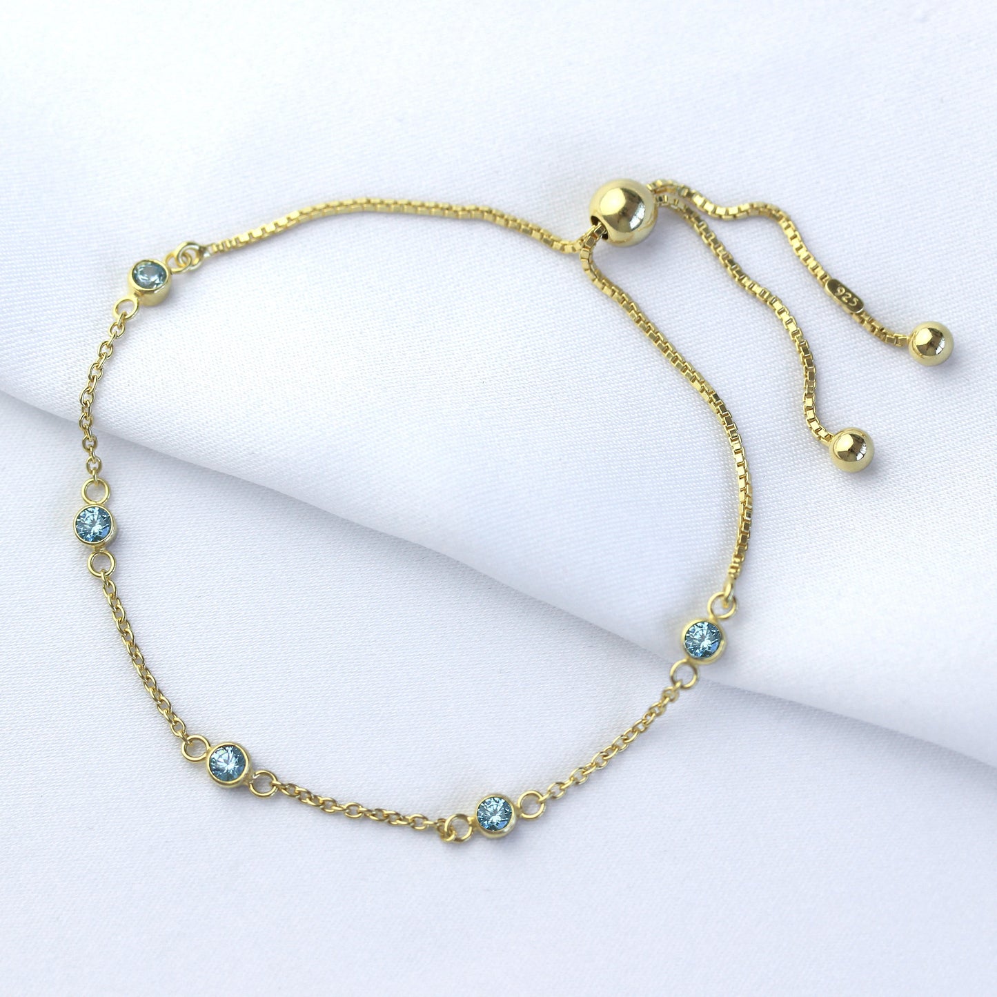Bracelet réglable en argent sterling plaqué or avec aigue-marine et zircone cubique