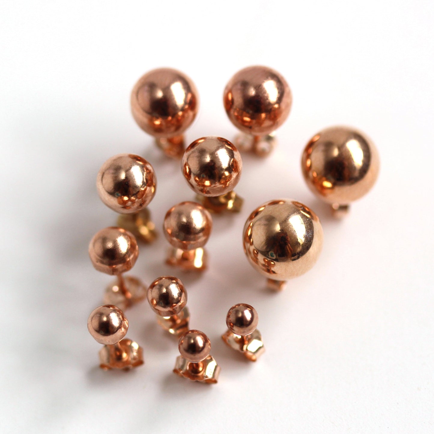 Boucles d'oreilles à tige en or rose 9 carats