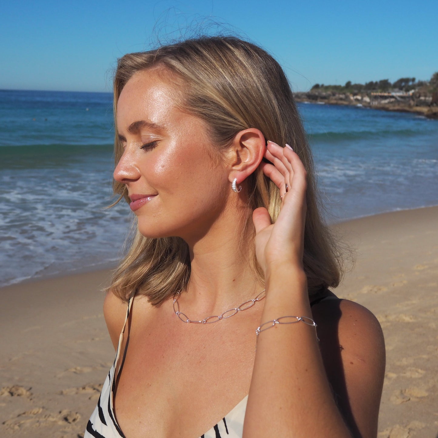 Boucles d'oreilles créoles ouvertes en argent sterling avec corde torsadée