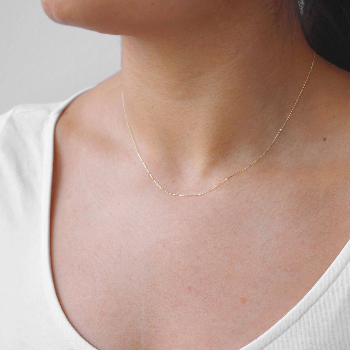 Collier chaîne gourmette en or 9 carats avec diamants taillés