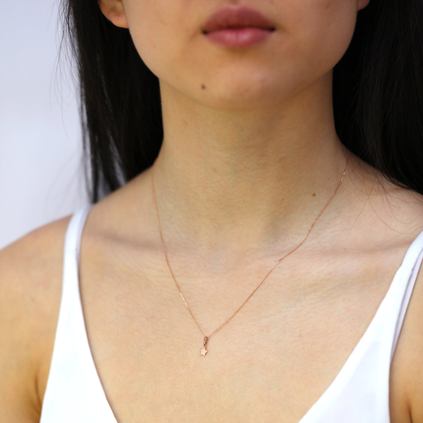 Collier avec pendentif étoile en or rose 9 carats