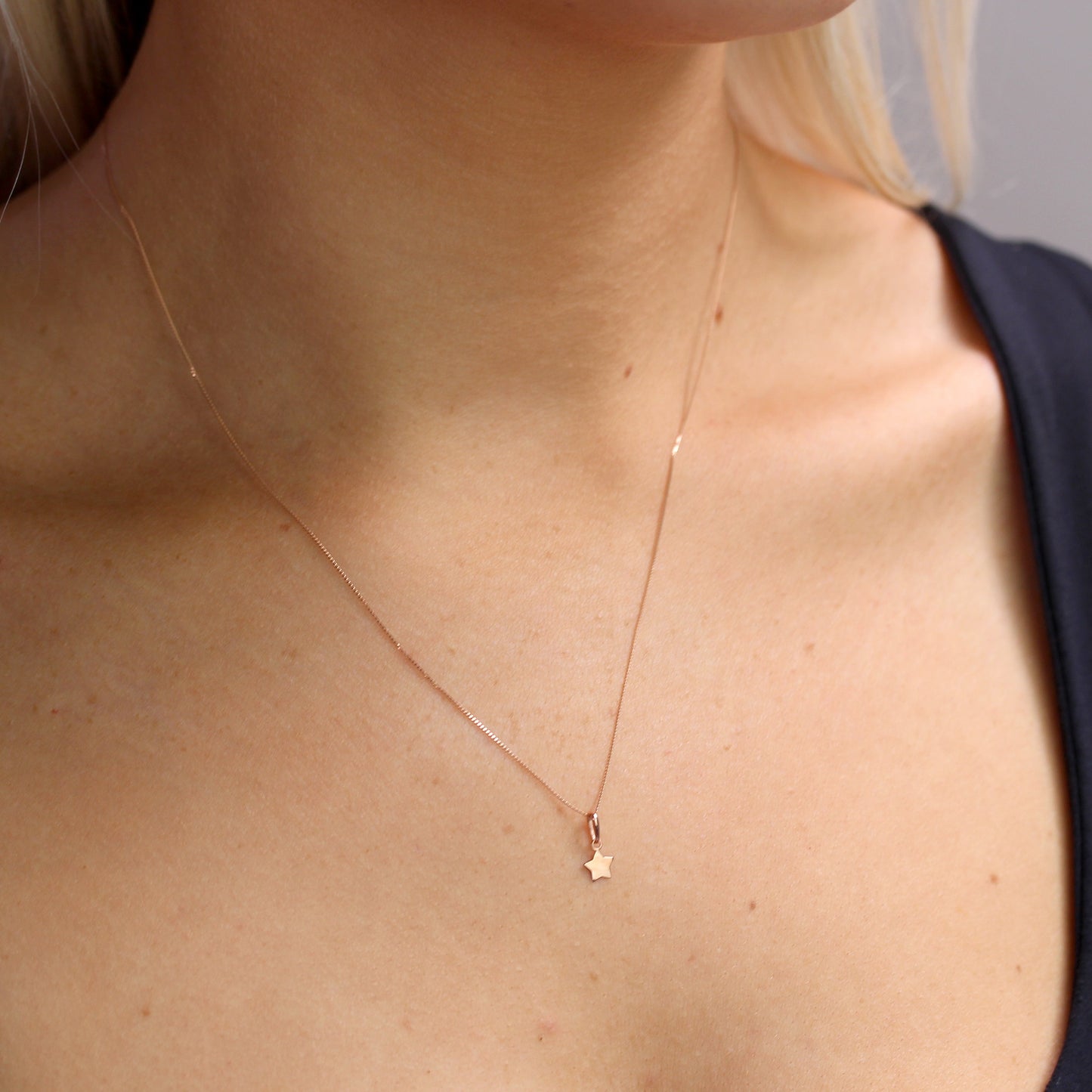 Collier avec pendentif étoile en or rose 9 carats