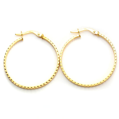 Boucles d'oreilles créoles en or jaune 9 carats