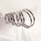 Boucles d'oreilles créoles torsadées en or blanc 9 carats de 2 mm