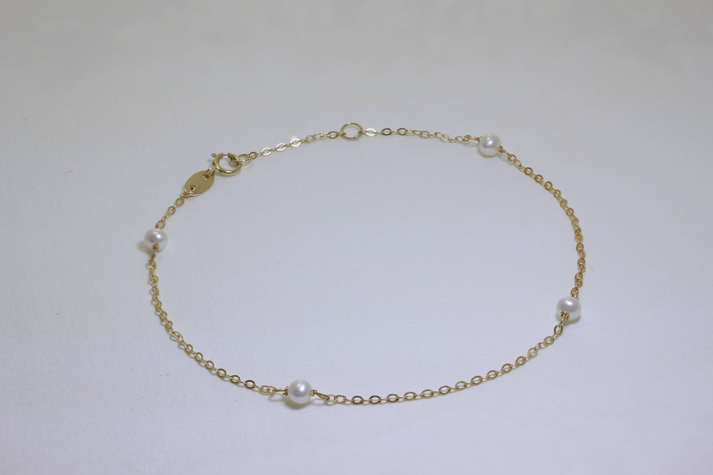 Bracelet extensible de 19 cm en or 9 carats et perles de 3 mm