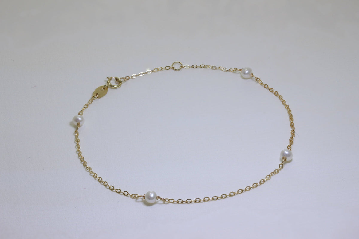 Bracelet extensible de 19 cm en or 9 carats et perles de 3 mm