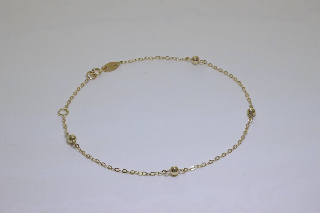 Bracelet extensible en or 9 carats avec pompon martelé de 19 cm