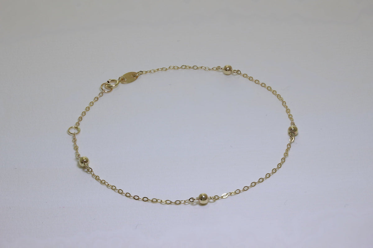 Bracelet extensible en or 9 carats avec pompon martelé de 19 cm