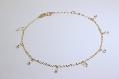Bracelet extensible en or 9 carats de 19 cm avec perles en oxyde de zirconium transparent