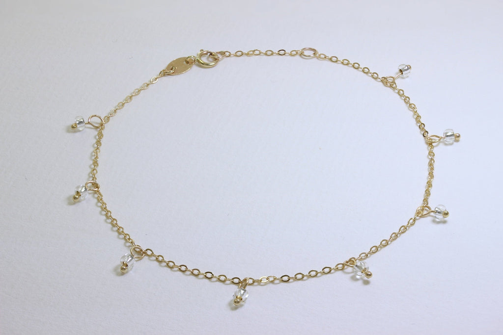 Bracelet extensible en or 9 carats de 19 cm avec perles en oxyde de zirconium transparent