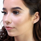 Boucles d'oreilles à tige en or 9 carats avec zircones cubiques transparents et demi-cercles minimalistes