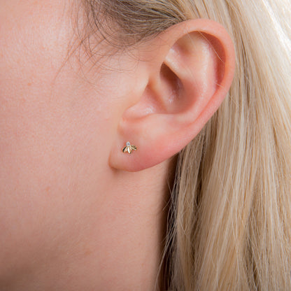 Boucles d'oreilles à tige triple feuille en or 9 carats et zircones cubiques transparents