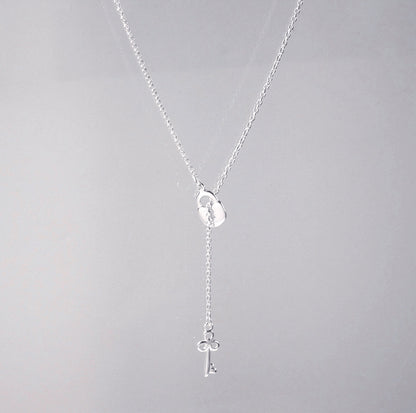 Collier pendentif cadenas à clé en argent sterling