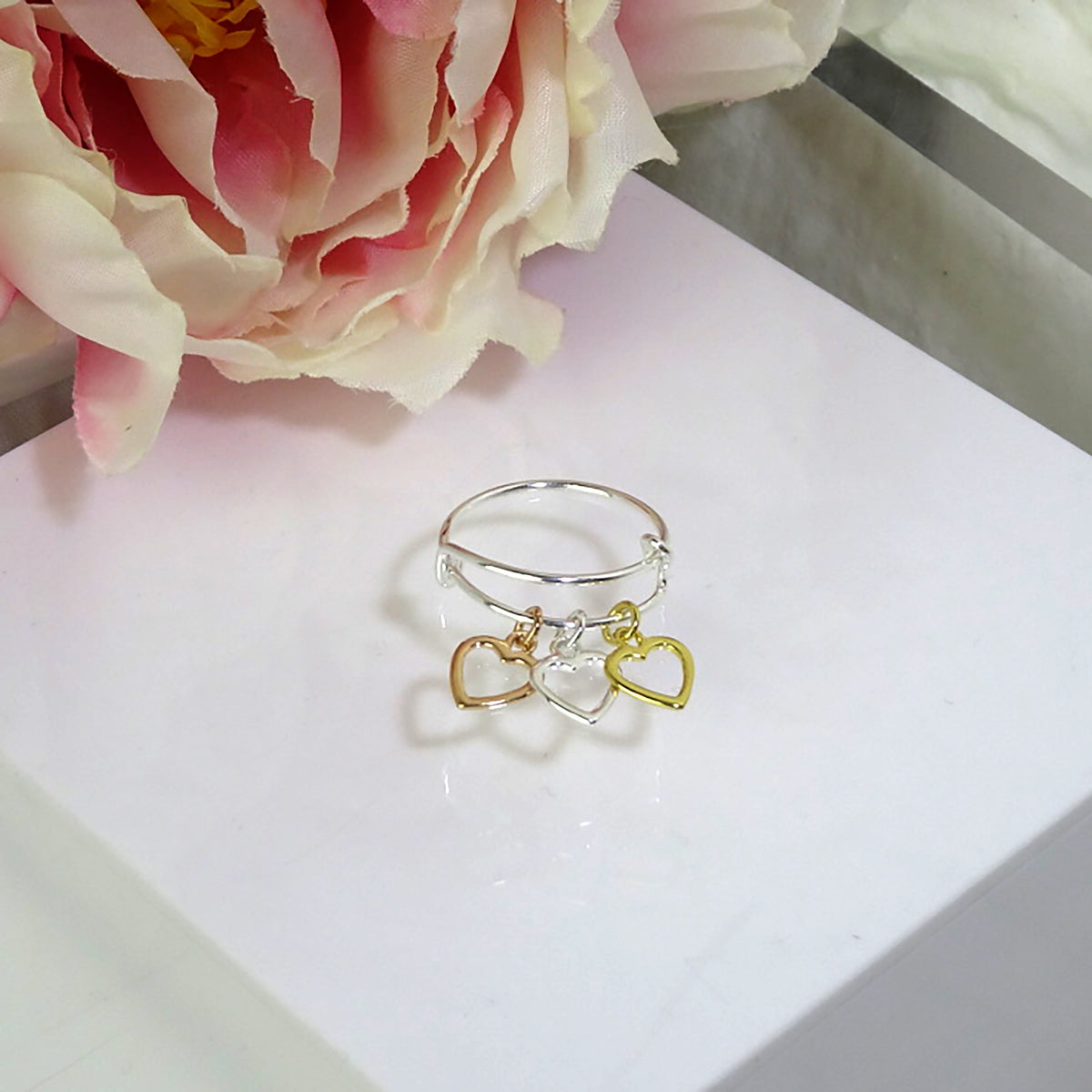 Bague réglable en argent sterling et plaqué or avec triple cœur