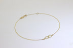 Bracelet extensible Infinity en or fin 9 carats de 19 cm