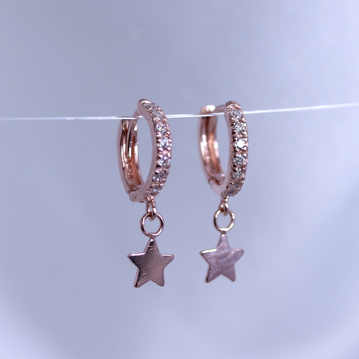 Boucles d'oreilles créoles en argent sterling plaqué or rose avec breloque étoile de 12 mm
