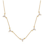 Collier en argent sterling plaqué or avec plusieurs trios de zircones cubiques