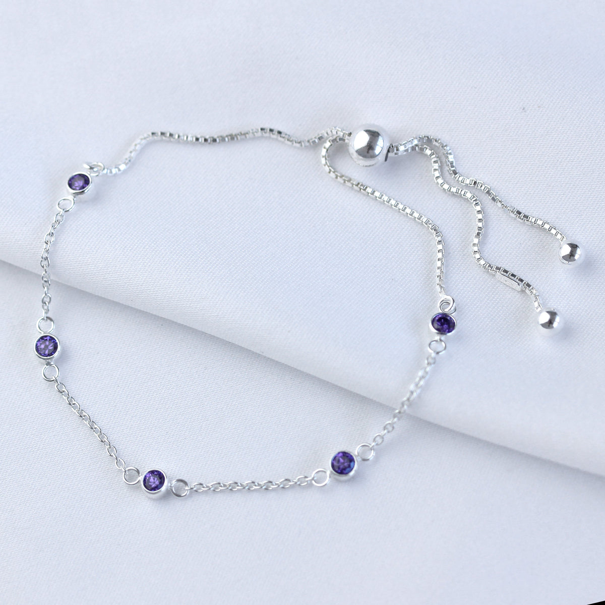 Bracelet réglable en argent sterling avec plusieurs améthystes et zircones cubiques