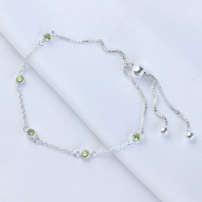 Bracelet réglable en argent sterling avec plusieurs péridots et zircones cubiques