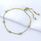 Bracelet réglable en argent sterling plaqué or avec aigue-marine et zircone cubique
