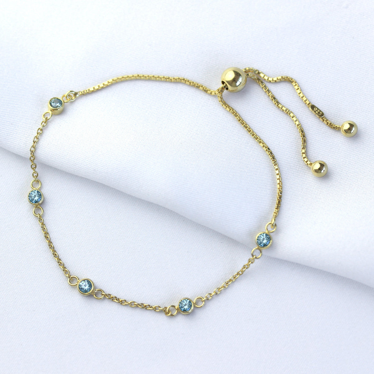 Bracelet réglable en argent sterling plaqué or avec aigue-marine et zircone cubique