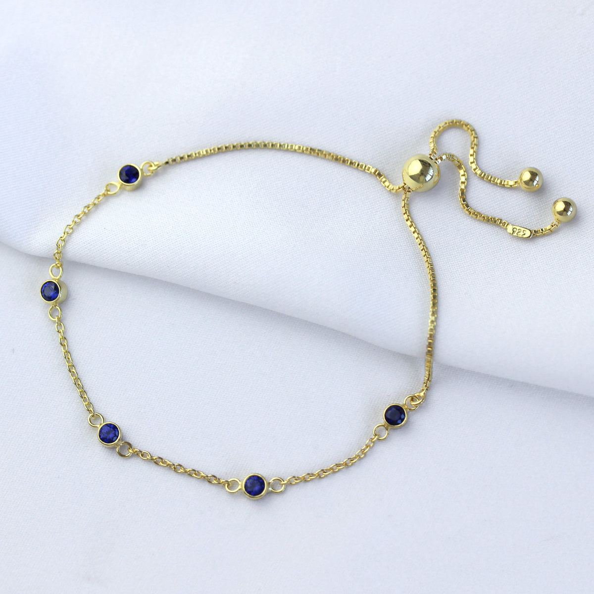 Bracelet réglable en argent sterling plaqué or avec saphir et zircone cubique
