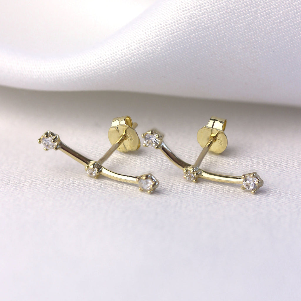 Boucles d'oreilles grimpantes à triple zircone cubique en or 9 carats