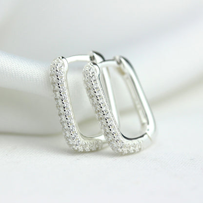 Boucles d'oreilles créoles ovales en argent sterling avec pavé de zircones cubiques de 15 mm