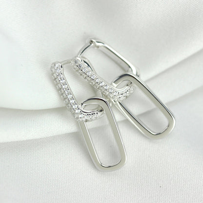 Boucles d'oreilles créoles ovales en argent sterling avec zircones cubiques