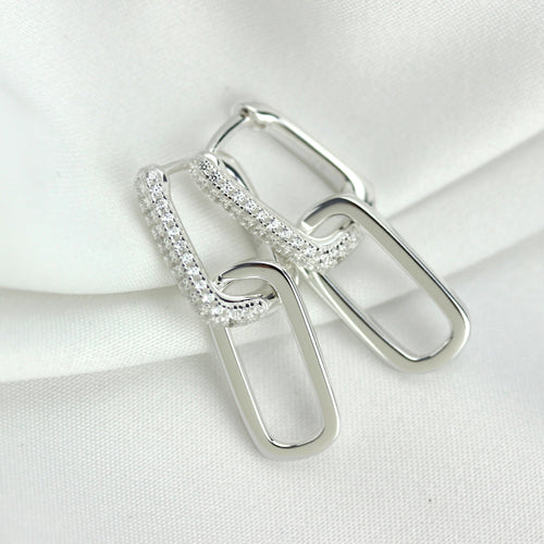 Boucles d'oreilles créoles ovales en argent sterling avec zircones cubiques