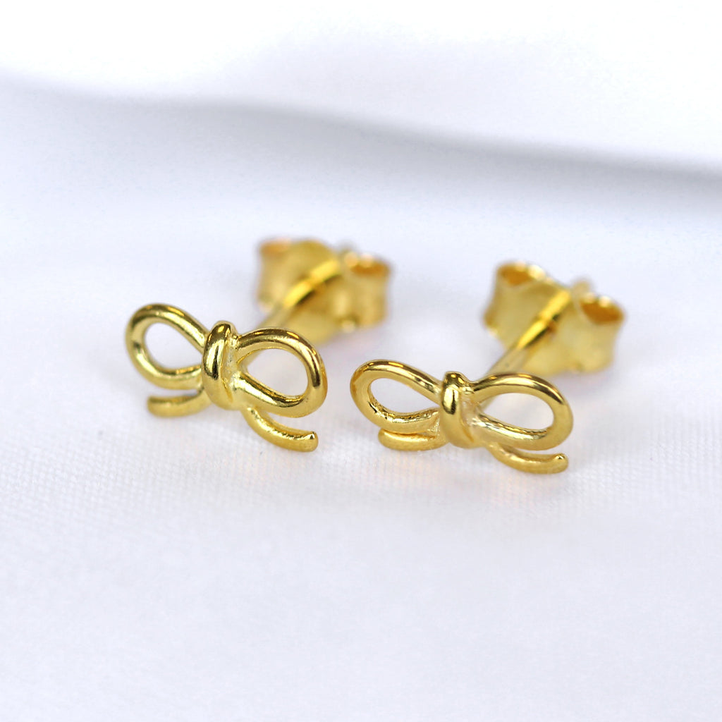 Boucles d'oreilles à tige en argent sterling plaqué or avec nœud
