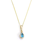 Pendentif en or 9 carats avec topaze bleu ciel et pierre de naissance de novembre