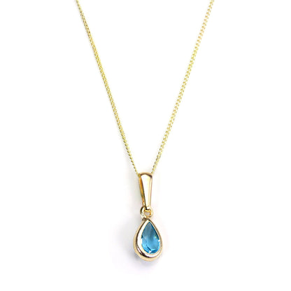 Pendentif en or 9 carats avec topaze bleu ciel et pierre de naissance de novembre