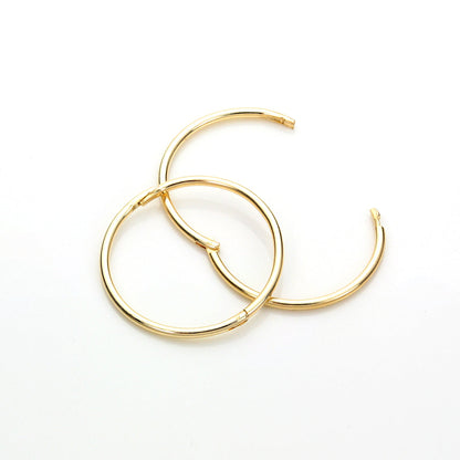 Boucles d'oreilles créoles en or jaune 9 carats