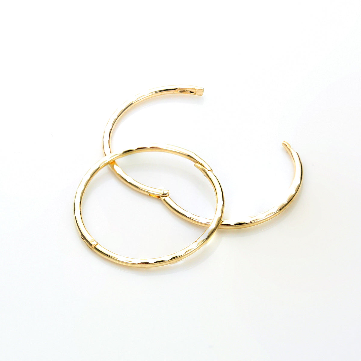 Boucles d'oreilles créoles articulées en or jaune 9 carats avec diamants taillés