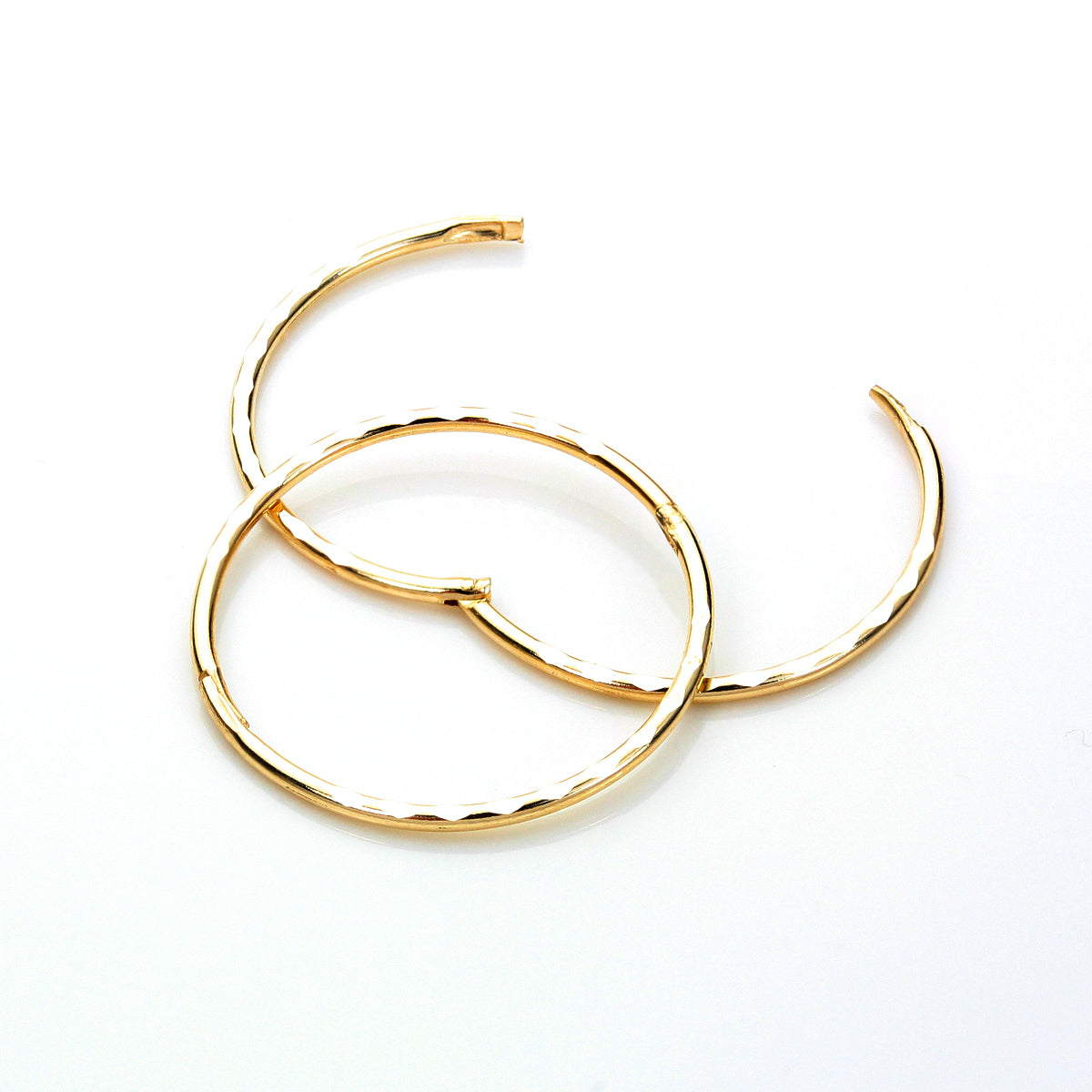 Boucles d'oreilles créoles articulées en or jaune 9 carats avec diamants taillés