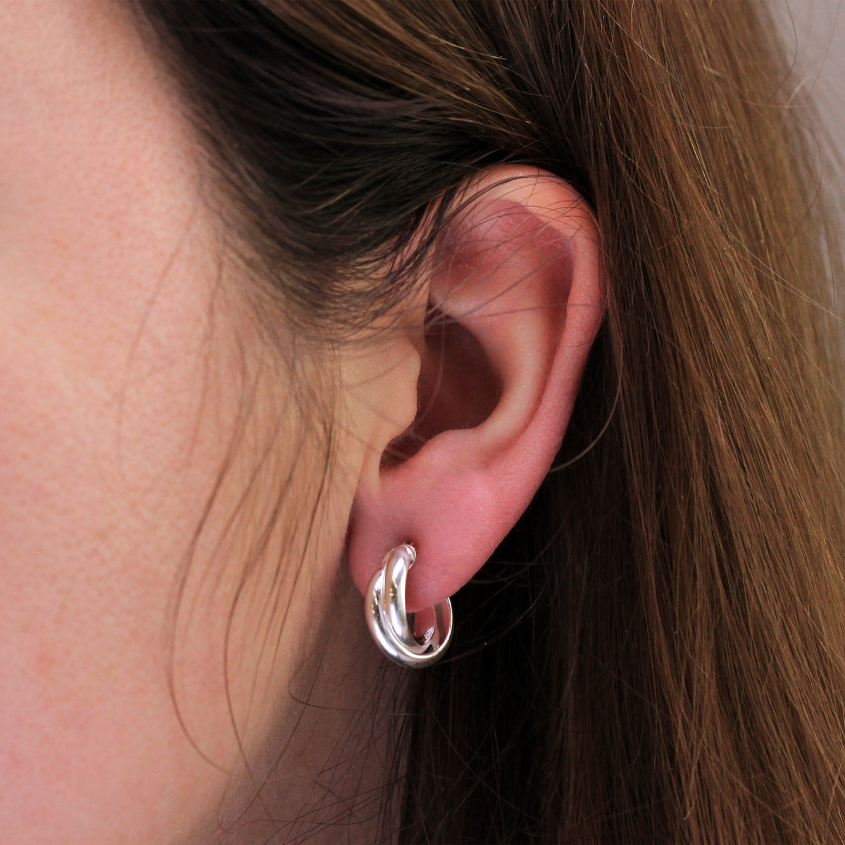 Boucles d'oreilles créoles en argent sterling à double torsion entrelacées