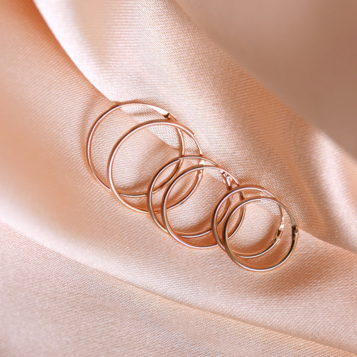 Boucles d'oreilles créoles Light Sleeper en or rose 9 carats, 10 mm - 13 mm