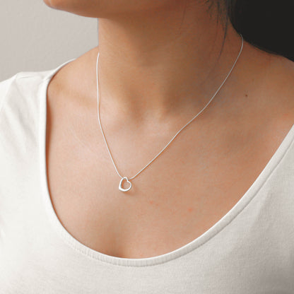 Collier avec pendentif en forme de cœur flottant en argent sterling