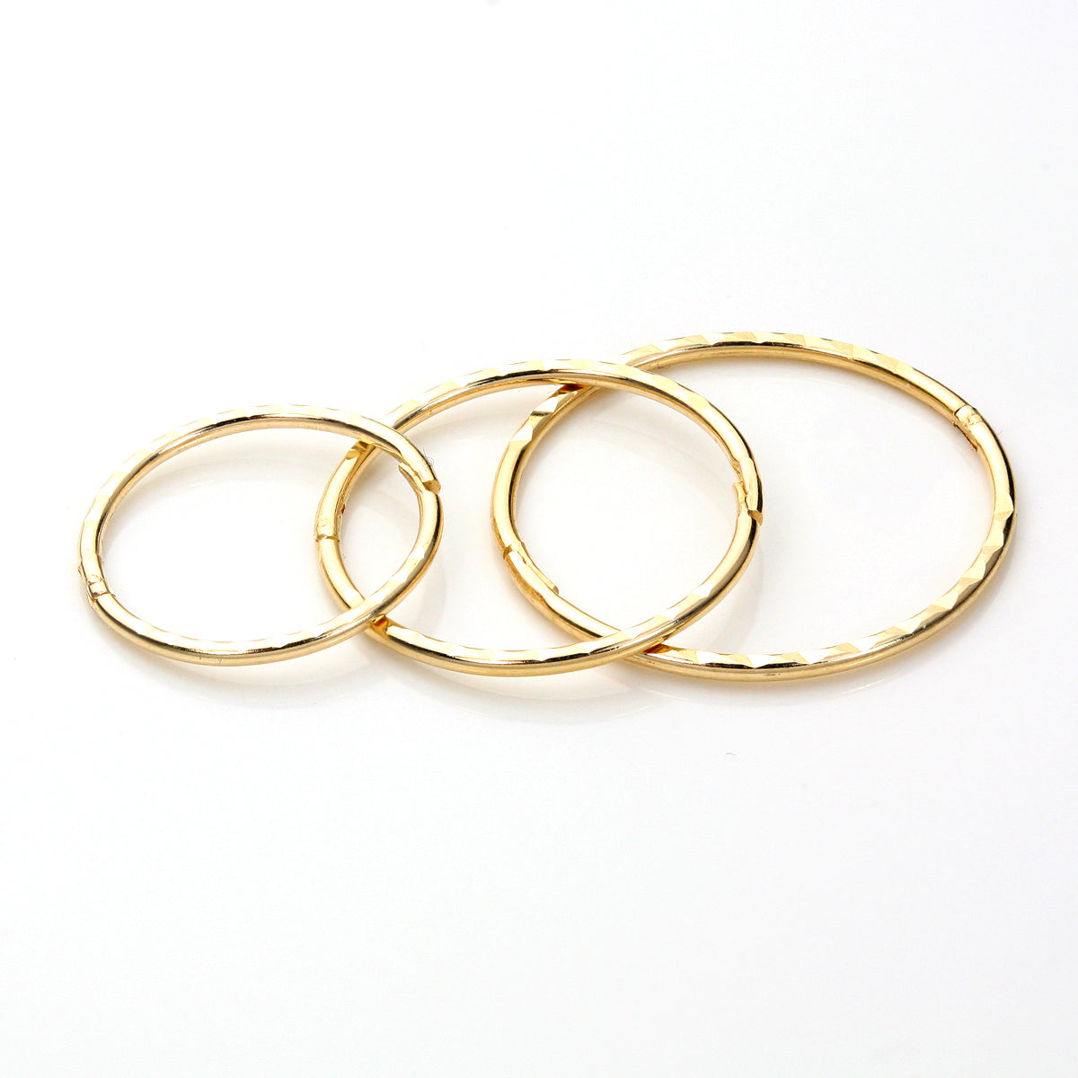 Boucles d'oreilles créoles articulées en or jaune 9 carats avec diamants taillés