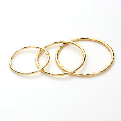 Boucles d'oreilles créoles articulées en or jaune 9 carats avec diamants taillés