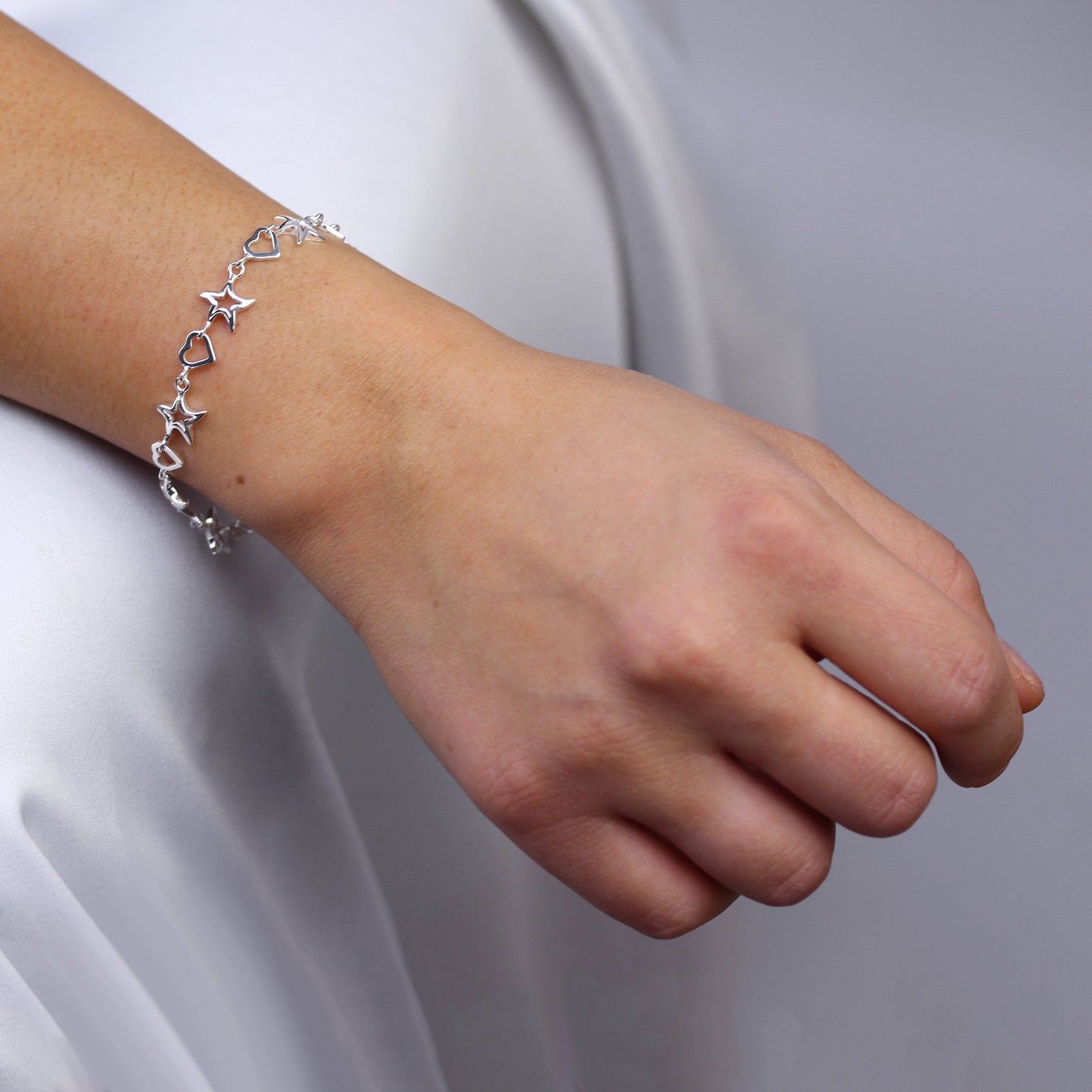 Bracelet en argent sterling avec cœur ouvert et étoile