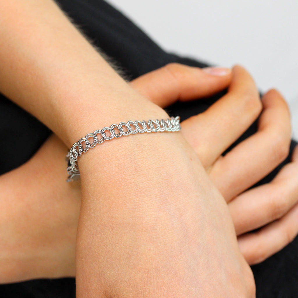 Bracelet à breloques double gourmette en argent sterling