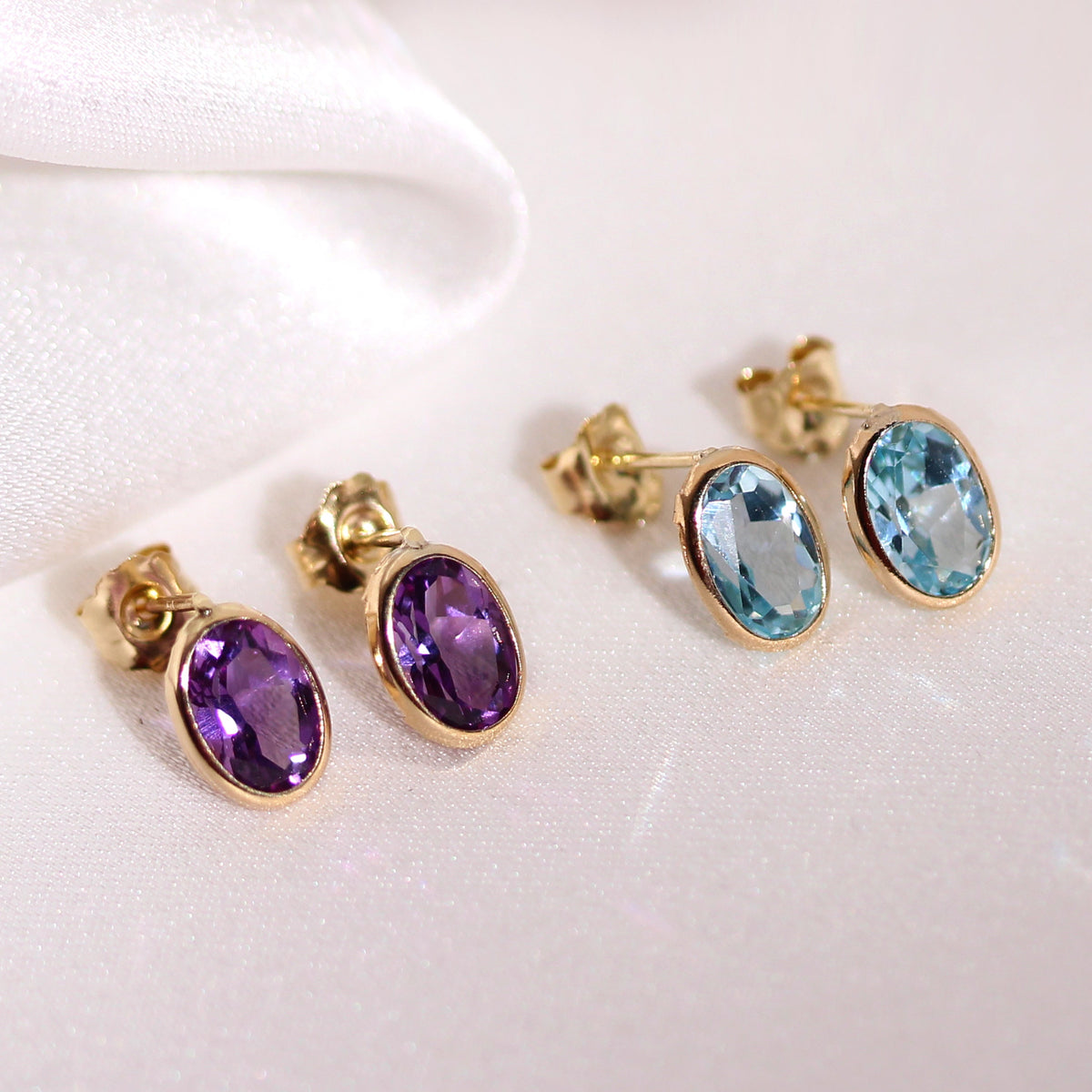 Boucles d'oreilles à tige en or 9 carats et pierres précieuses ovales de 6 mm