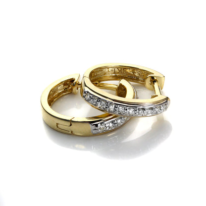 Boucles d'oreilles Huggie en or 9 carats avec diamants