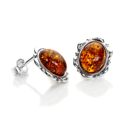 Boucles d'oreilles à tige en argent sterling et ambre de la Baltique serties de fleurs